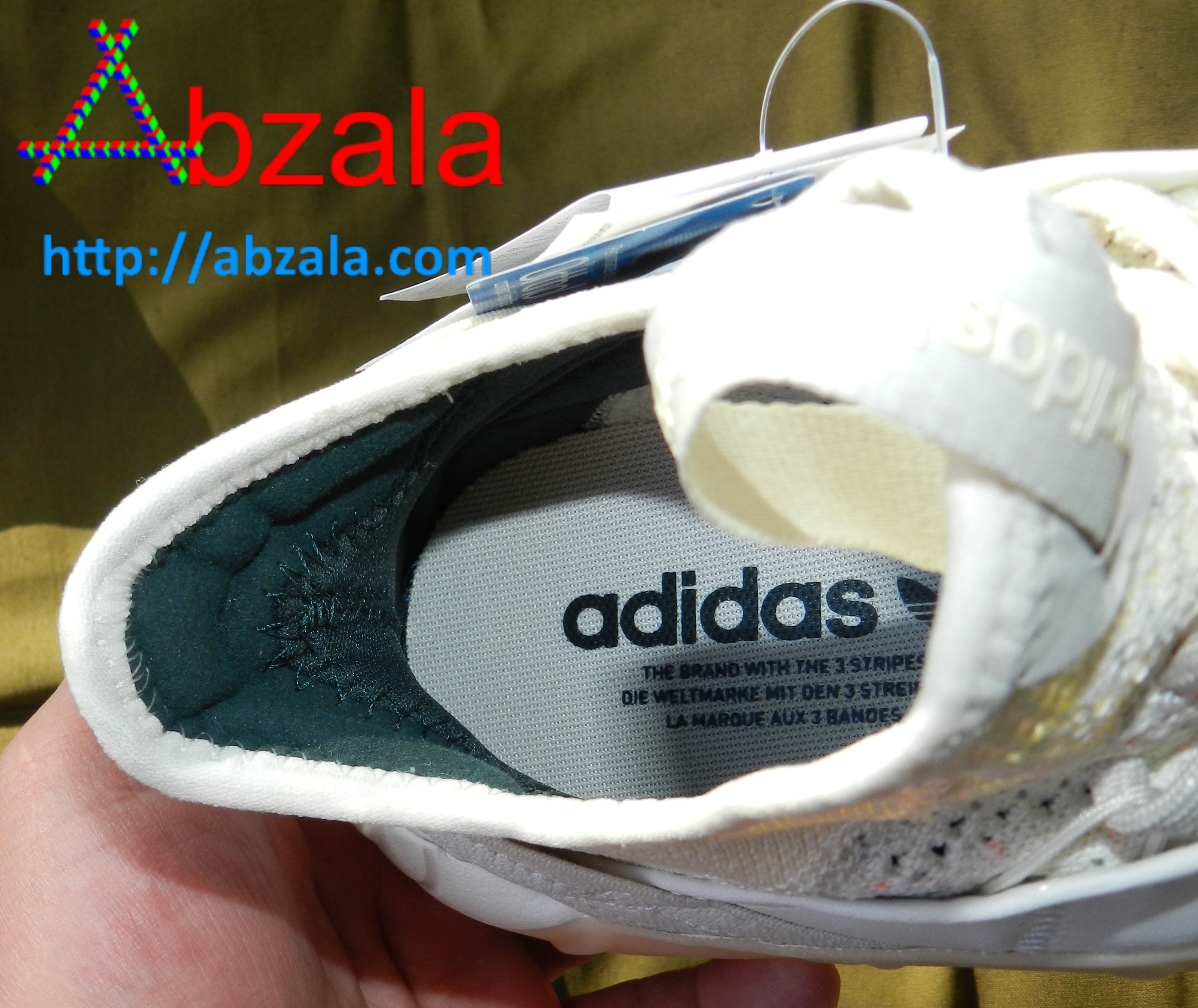 Кроссовки адидас подлинность. Как проверить оригинал кроссовок адидас. Проверить оригинальность кроссовок. Как узнать оригинальные кроссовки adidas. Узнать модель кроссовок.