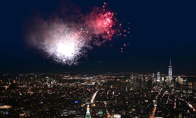 manhattan night view with fireworks in new york thumbs