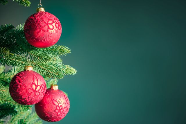 dark green christmas background with red balls