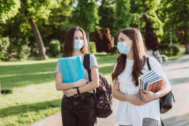 two female students wearing protective