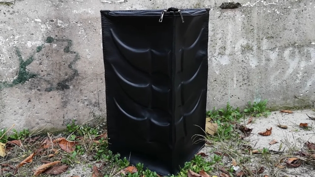 unusual-leather-large-triangular-backpack-001-thumbs
