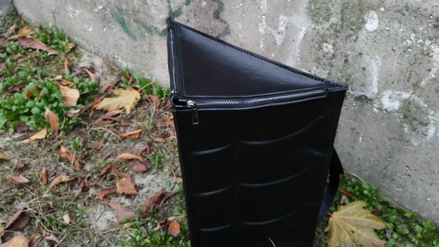 unusual leather large triangular backpack 002thumbs