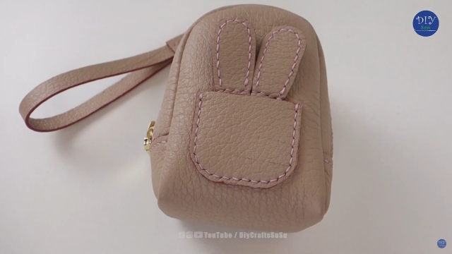leather-backpack-keychain-zipper-001-thumbs